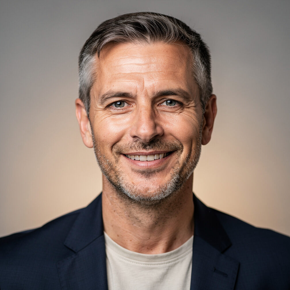 Portrait of a middle aged man smiling for a testimonial